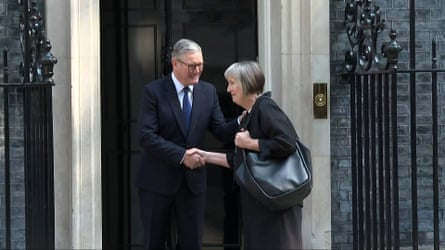 Keir Starmer shakes hands with Harriet Harman outside No 10