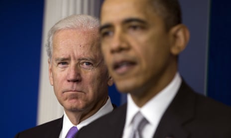 Joe Biden listens as Barack Obama speaks, in the aftermath of the Sandy Hook school shooting, in December 2012.