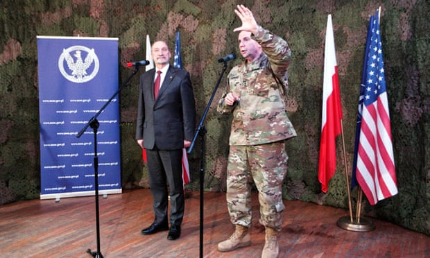 The Polish defense minister and the commander of the US army in Europe hold a press conference in Poland on Wednesday.