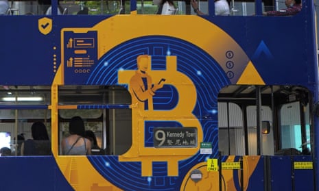 an advertisement of Bitcoin, one of the cryptocurrencies, is displayed on a tram in Hong Kong