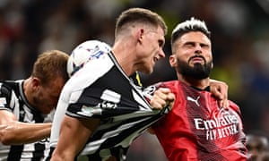 FBL-EUR-C1-MILAN-NEWCASTLE<br>AC Milan's French forward #09 Olivier Giroud (R) jumps for the ball during the UEFA Champions League 1st round group F football match between AC Milan and Newcastle at the San Siro stadium in Milan on September 19, 2023. (Photo by GABRIEL BOUYS / AFP) (Photo by GABRIEL BOUYS/AFP via Getty Images)