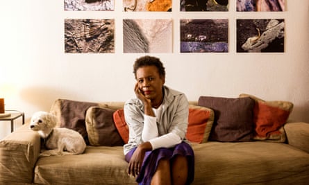 Poet Claudia Rankine and dog Sammy at home.
