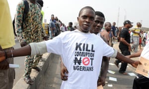 Photo credit: Pius Utomi Ekpei/AFP/Getty Images A protester sports an anti-corruption T-shirt in Lagos.