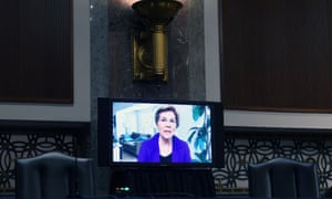 Warren asking Fauci questions remotely at the Senate hearing today. Fauci was in the chamber, wearing a mask which he removed to speak then repositioned after answering.