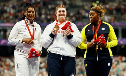 Sabrina Fortune of Britain celebrates her gold on the podium