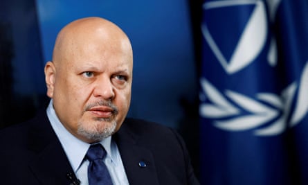 Khan with ICC flag behind