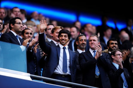 Khaldoon al-Mubarak (left) alongside City owner Sheikh Mansour at the then City of Manchester Stadium in August 2010