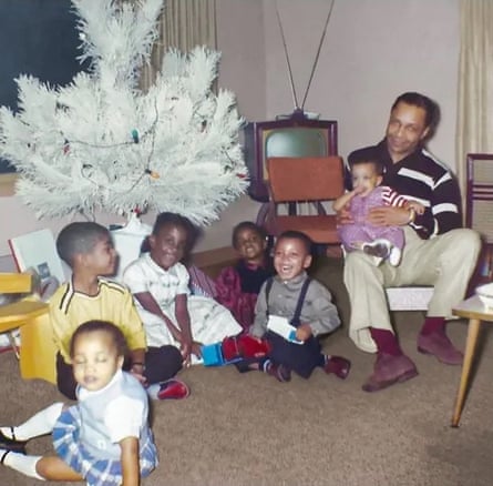 Charles ‘Chazz’ Smith (third from right), with Prince sitting on his father John L Nelson’s knee, Christmas 1959.