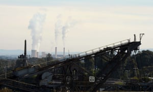 Yallourn coal-fired power station behind a disused coal dredger in Morwell, Victoria.