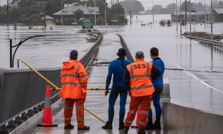 State Emergency Service members look over flood waters in Richmond,  New South Wales, in March 2022.State Emergency Service members are seen near a flooded area in Richmond of New South Wales, Australia, March 4, 2022. Severe weather system, which has been ravaging Queensland and the northern New South Wales since last week, is expected to continue this week.
Australia New South Wales Flood - 04 Mar 2022