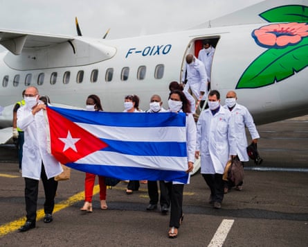 A delegation of Cuban doctors arrive on Martinique as part of a medical assistance programme during Covid in 2020.