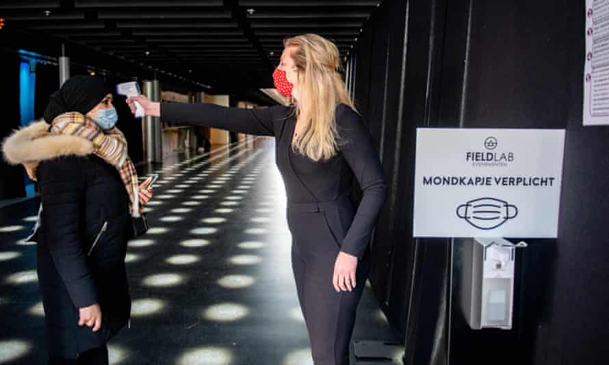 A participant has their temperature checked before entering the ZiggoDome.