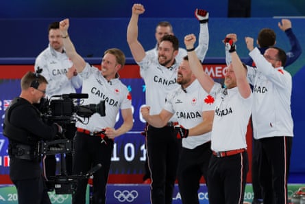 The Canada team show their delight after the match.