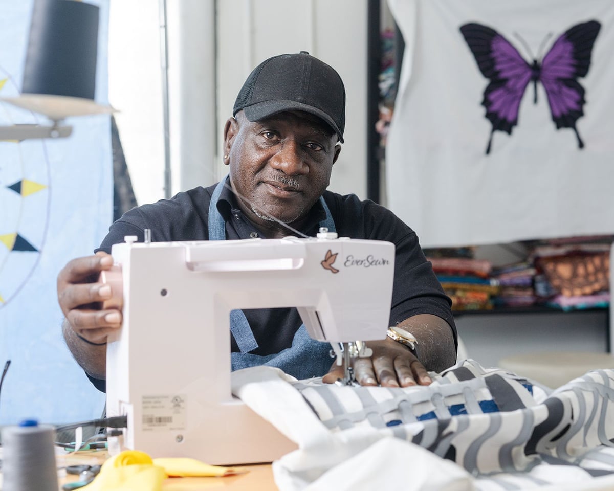 Man with sewing machine