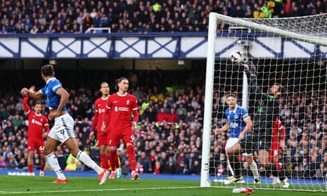Alisson Becker of Liverpool saves from Dominic Calvert-Lewin of Everton.