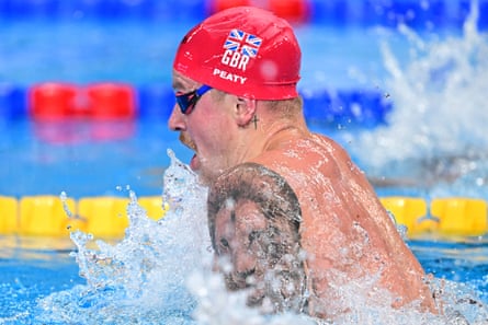 Adam Peaty competes in the final of the men’s 100m breaststroke in Doha in February 2024