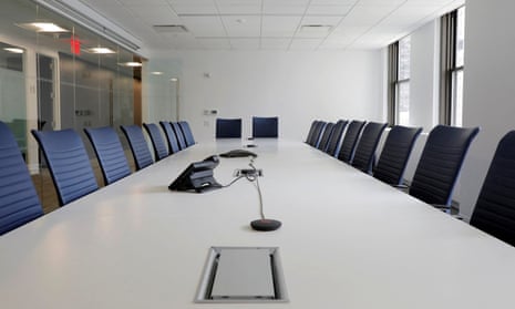 an empty boardroom table