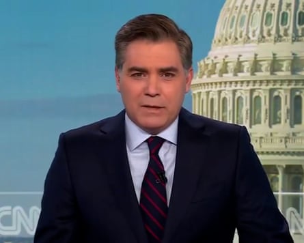 Jim Acosta in a suit.
