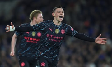 Phil Foden has scored twice in the opening half as Manchester City lead Brighton 3-0.