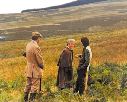 Andrew, Epstein and Maxwell standing talking on a moorland
