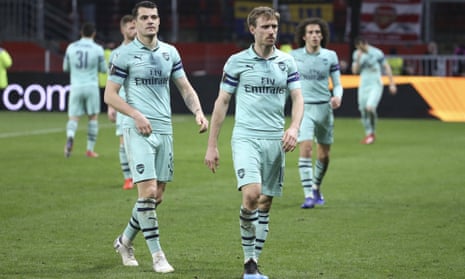 The Arsenal players trudge off after their Europa League capitulation against Rennes