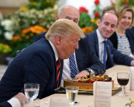 Donald Trump with a birthday cake in 2018
