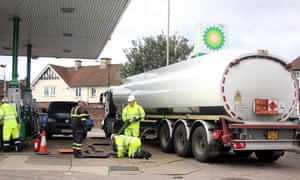 Military personnel are being trained to refuel the BP garage at Farm Hill Road, Waltham Abbey, Essex this afternoon.