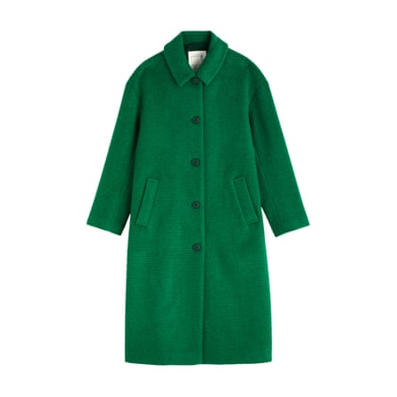 A long green single-breasted coat on a white background