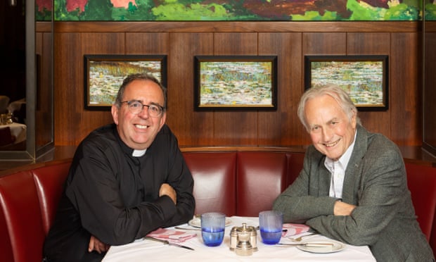 Rev Richard Coles and Richard Dawkins sitting at a table at the Colony Grill in London