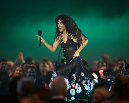 Olivia Dean performing at the Brit Awards