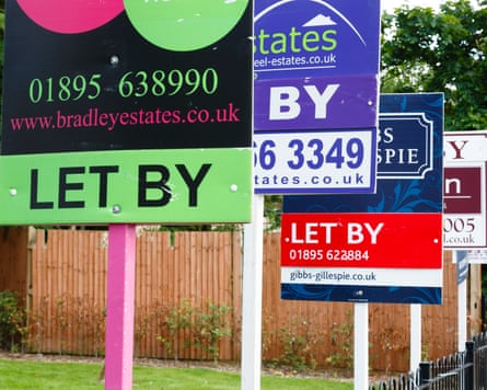 To let estate agent signs in a row