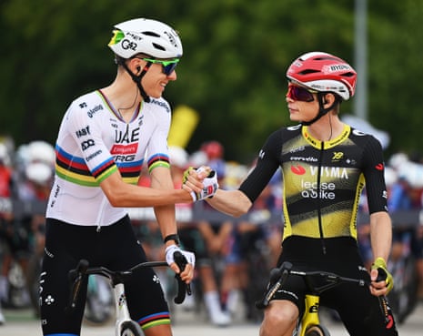 (L-R) Tadej Pogačar of UAE Team Emirates and Jonas Vingegaard of Visma-Lease a Bike before stage one of the Tour de France 2025 rollout.