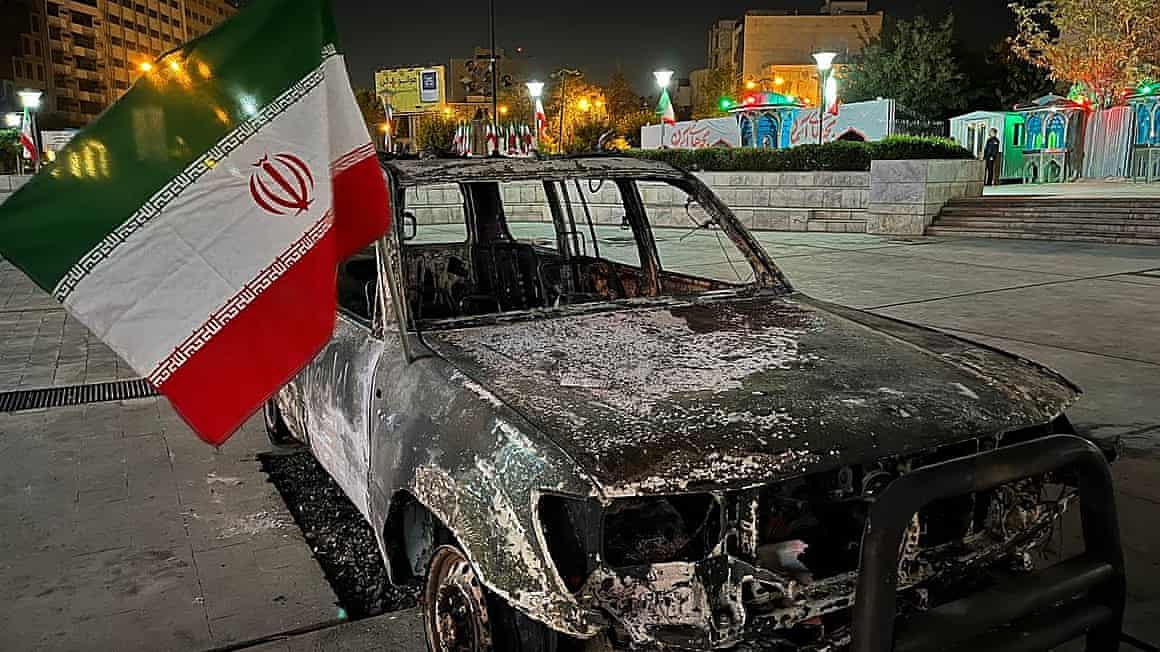 An Iranian Red Crescent ambulance hit by an Israeli airstrike on display in Tehran