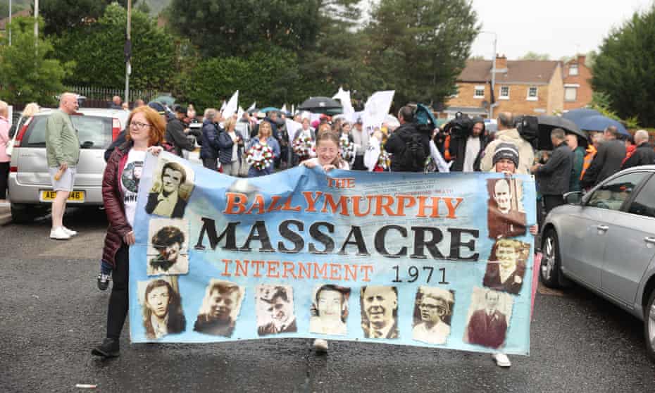 The families of some of the 10 victims shot dead by British soldiers in Ballymurphy in 1971 marching in Belfast, 8 August 2021. 