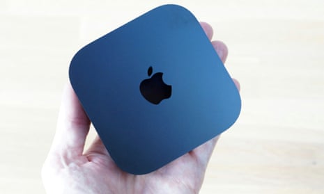 The Apple TV 4K A15 2022 review box held in a hand