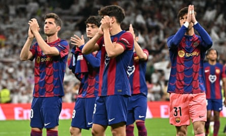 Barcelona players acknowledge fans after defeat by Real Madrid
