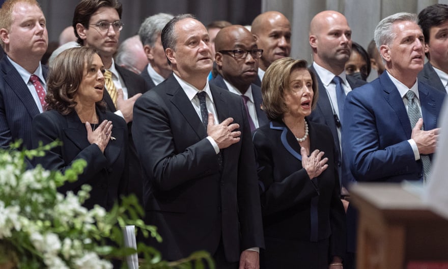 Vice-President Kamala Harris, from left, her husband Doug Emhoff, House speaker Nancy Pelosi, and House minority leader Kevin McCarthy, sing the national anthem during the memorial service for Queen Elizabeth II.