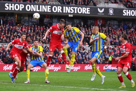 Taylor Harwood-Bellis thunders a header that hits the woodwork.