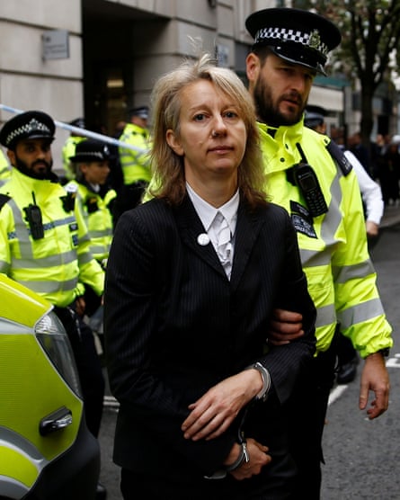 Extinction Rebellion co-founder Gail Bradbrook being arrested after a protest in London in October 2019.