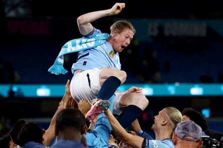 Kevin De Bruyne is given a sendoff by his Manchester City teammates.