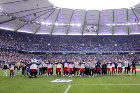 Hamburg players celebrate with their fans.