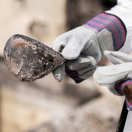 Hironaka holds up a charred golf club