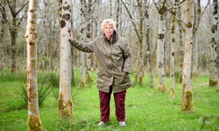Val Green stands among ash and oak trees.