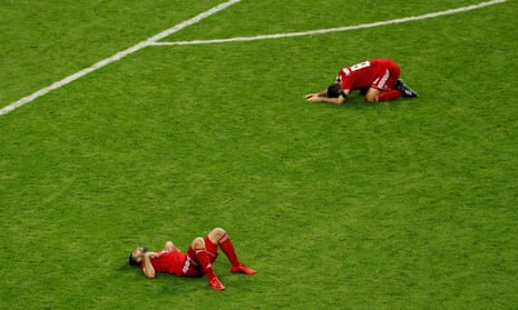 The Iranian players are disappointed after the final whistle.