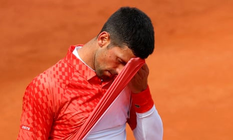 Novak Djokovic reacts during his Italian Open quarter-final defeat by Denmark's Holger Rune.