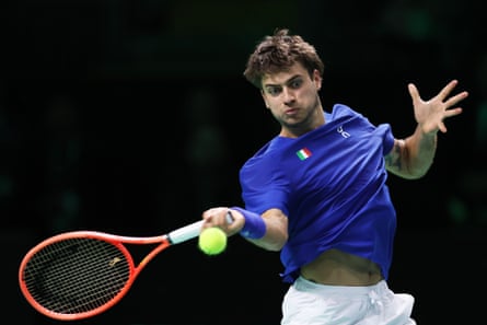 Flavio Cobolli of Italy plays a forehand against Jaume Munar of Spain