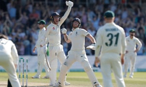Ben Stokes (centre) and Jack Leach lift their arms in celebration after the former hit the winning runs at Headingley.