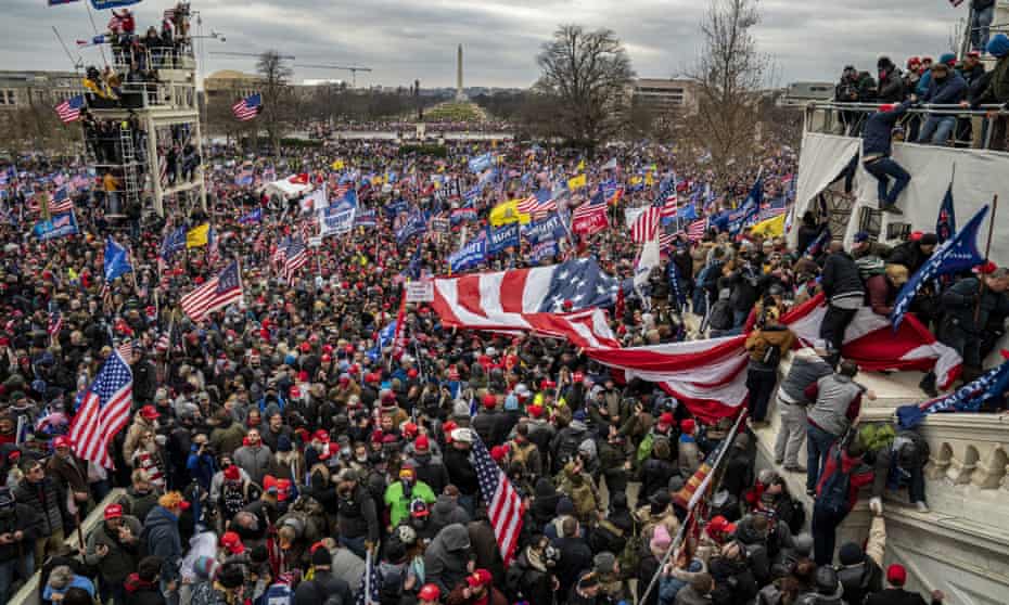 Pro-Trump rioters breach the security perimeter and penetrate the Capitol to protest against the electoral college vote count that would certify President-elect Joe Biden as the winner in Washington on 6 January 2021.