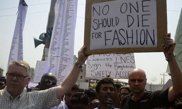 Bangladeshi activists and relatives of the victims of the Rana Plaza building collapse take part in a protest marking the first anniversary of the disaster at the site where the building once stood, in Savar, on the outskirts of Dhaka.