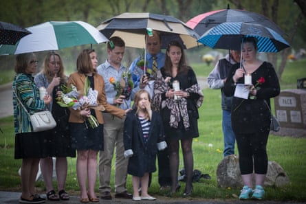 Multiple generations grieve at the memorial service.